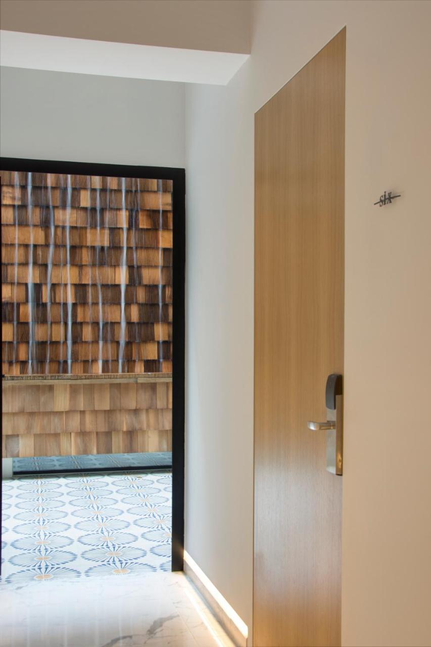מלון Coco-Mat Athens Jumelle מראה חיצוני תמונה A door with a water curtain